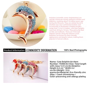 Detailed size view of rhinestone dolphin keychain with 12.9cm total length measurement