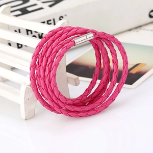 Detail of rose red multilayer woven PU leather bracelet with silver magnetic metal clasp