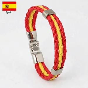 Handmade braided leather bracelet in Spanish flag colors with silver magnetic clasp