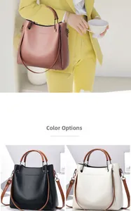 Gros plan sur la texture du cuir grainé et les détails métalliques du sac seau