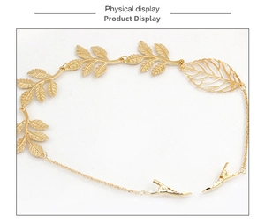 Detail of golden leaf hair chain with hollow leaves and small metal clips for fixing