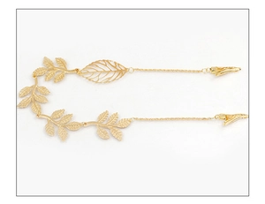 Golden leaf chain hair clip accessory with dual duckbill clips on white background