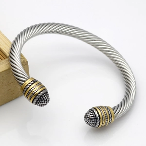Vintage steel cable wire bracelet with two-tone gold and silver finish details