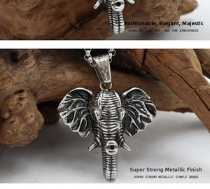 Macro shot of vintage style elephant pendant with detailed texture and antique silver finish