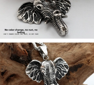 Detailed macro view of retro elephant pendant with vintage finish and steel chain necklace