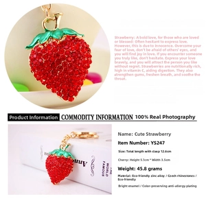 Close-up detail of rhinestone strawberry keychain made of high-quality zinc alloy