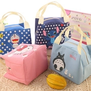 Detailed view of insulated lunch bags featuring various cute cartoon animal character prints