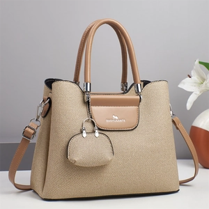 Sac fourre-tout chic en toile tissée beige avec bordure en cuir marron et bandoulière