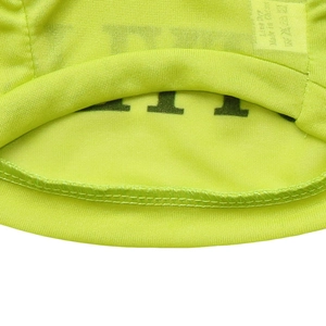 Close-up of breathable neon green mesh fabric with reinforced double-stitch sewing
