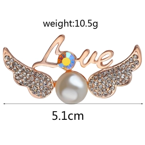 Rose gold heart wing brooch with pearl and colorful gemstone detail, 5.1cm width