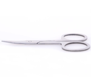 Detailed close-up of curved stainless steel beauty scissors for precise eyebrow trimming