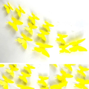Set of 12 3D yellow butterfly wall stickers in a flying formation on white background