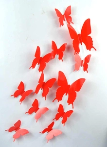 Set of 12 red 3D butterfly wall stickers with various sizes for creative home decoration
