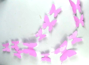 Detailed view of pink 3D butterfly wall stickers with realistic folded wings effect