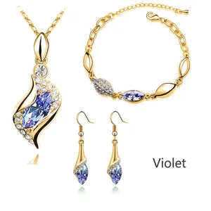 Detailed set of violet marquise crystal necklace bracelet and earrings in gold finish