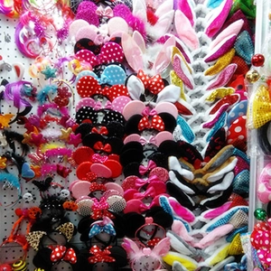Wholesale display of varied Valentine's Day headbands with heart and glitter details