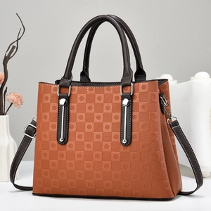 Fashionable orange checkered embossed tote bag with top handles and adjustable strap