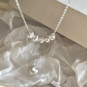 Minimalist 925 sterling silver beaded Y-necklace with spiral texture and tassel pendant