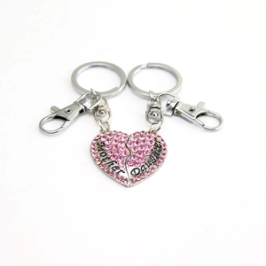 Silver mother daughter heart keychain set with pink crystals and split heart design