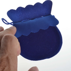 Blue velvet drawstring pouch for jewelry with elegant wavy scalloped edge design