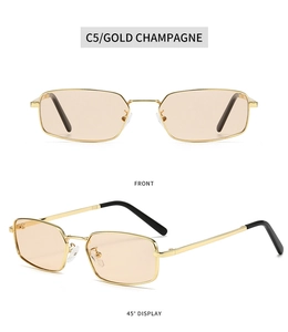 Detail of vintage gold metal small square frame sunglasses with champagne lenses