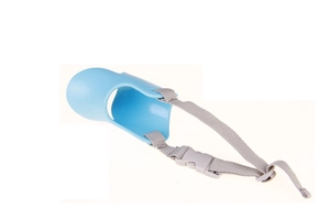 Top view of a light blue duck-billed pet muzzle with adjustable grey nylon strap