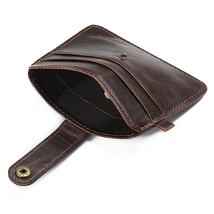 Dark brown leather card holder wallet with snap button closure and multiple card slots