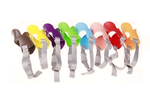 Silicone duckbill-shaped dog muzzles in various colors with adjustable nylon straps