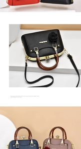 Detailed view of leather floral ornaments and crystal clasp on multi-color handbags