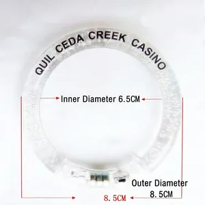Clear acrylic LED bracelet with internal bubbles and 6.5cm inner diameter measurement
