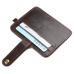 Business style dark brown leather card holder with multiple slots and brass snap button