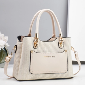 Elegant cream white textured handbag with gold hardware and fashion embossing