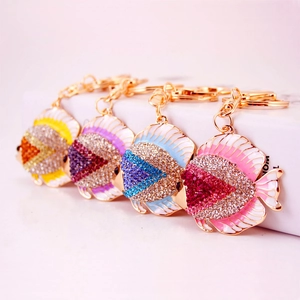 Colorful rhinestone tropical fish keychains in four vibrant enamel color combinations