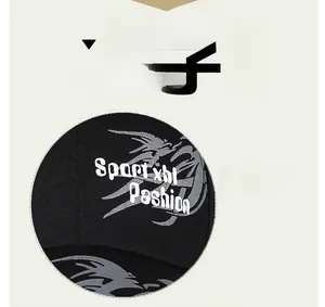 Detailed macro view of black canvas sports cap with silver Sport Fashion logo and dragon totem