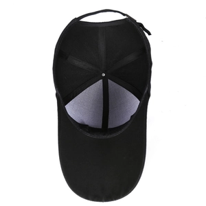 Internal view of black canvas baseball cap with reinforced seams and breathable mesh lining