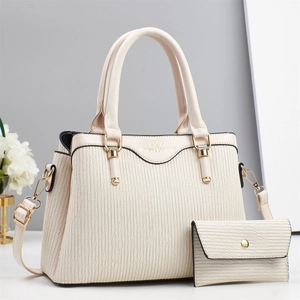 Chic cream tote bag and wallet set with pleated texture and gold hardware details
