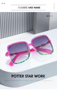 Detail of trendy square sunglasses with pink frames and gold metal temple accents
