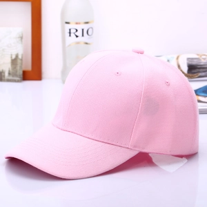 Detail view of pink cotton baseball cap featuring six-panel construction and curved brim