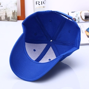 Detail view showing inner structure of a royal blue six-panel cotton baseball cap