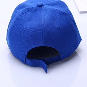 Detail view of the royal blue baseball cap back with adjustable velcro strap and cotton texture