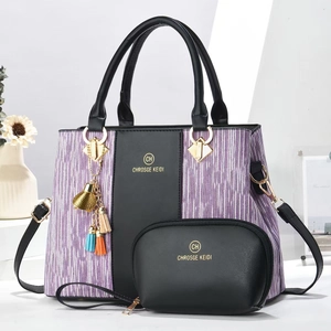Elegant two-piece black and purple tote bag set with detachable strap and tassel charm