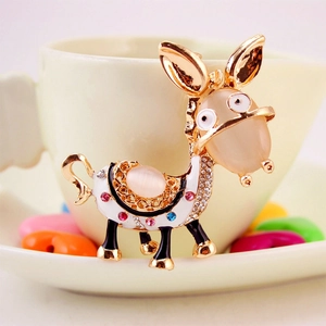 Sparkling rhinestone cartoon donkey keychain and bag charm with pink gemstone details