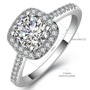 Detail of 7mm AAA CZ round ring with 10mm halo and 3 layers platinum plated finish