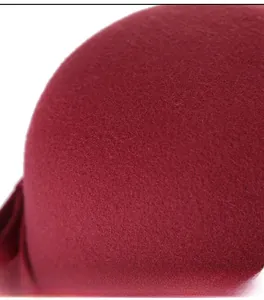Macro shot of high-quality wool felt texture on a burgundy vintage style fedora hat