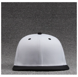 Front view of two-tone flat brim baseball cap in black and white twill fabric