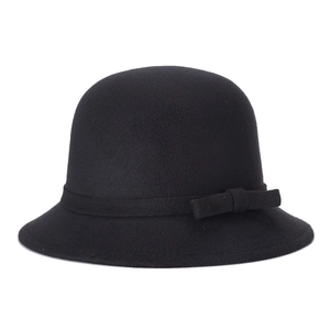 Classic black wool felt bowler hat with an elegant ribbon bow in British retro style