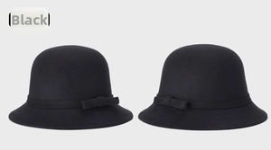 Close-up of black wool cloche hats featuring elegant round crown and matching bow details