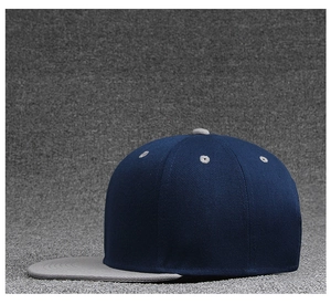 Side view of two-tone hip-hop cap in dark blue cotton with contrast grey flat brim