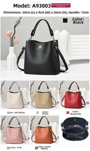 Detail view of lychee pattern leather bucket bag in six colors with interior zipper pocket