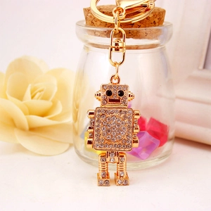 Creative gold robot keychain with sparkly rhinestones and sturdy metal keyring